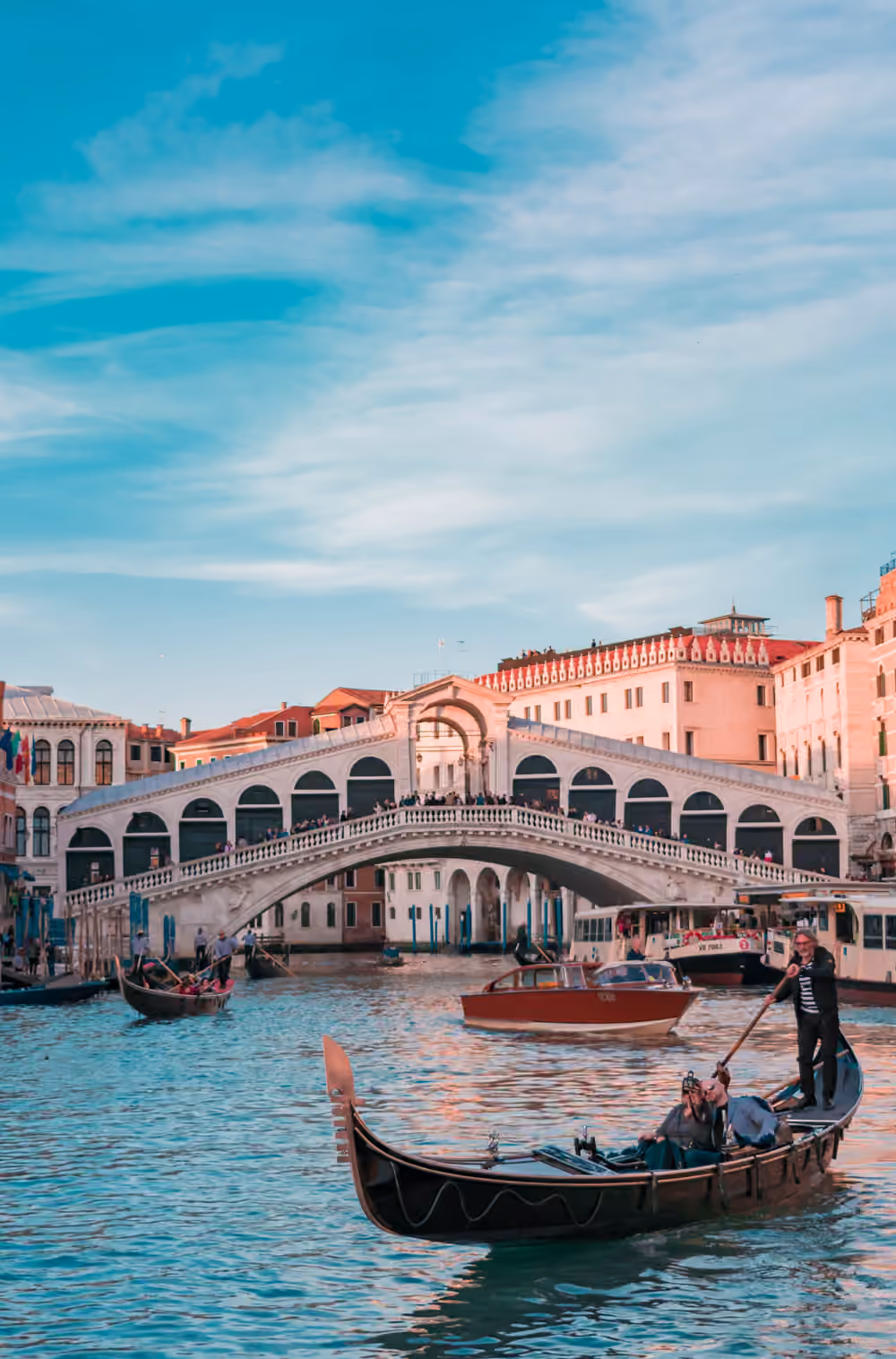 Gondolas on the Grand Canal in front of the Rialto Bridge