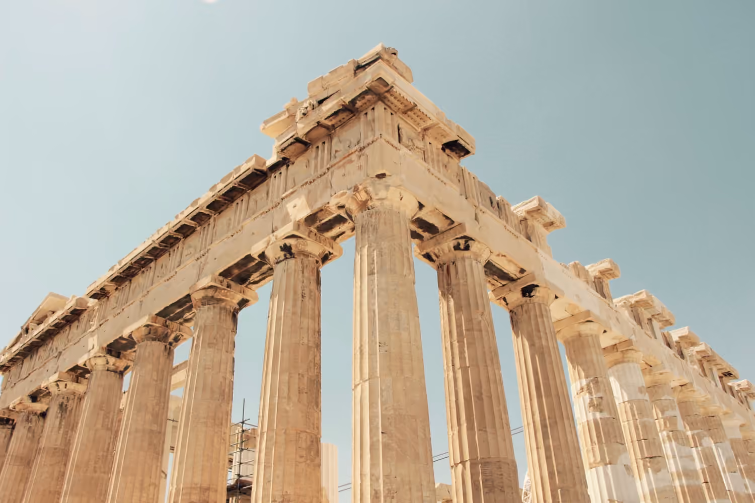 Columns of the Parthenon against a clear sky